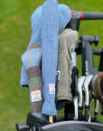 Mairead Hume® Harris Tweed® Golf Alignment Stick Cover in a golf bag on the golf course — lifestyle shot showing the cover in real-world use
