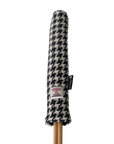 Mairead Hume® Black & White Houndstooth Harris Tweed® Golf Alignment Stick Cover — upright product shot showing Harris Tweed® Orb label, handmade in Scotland